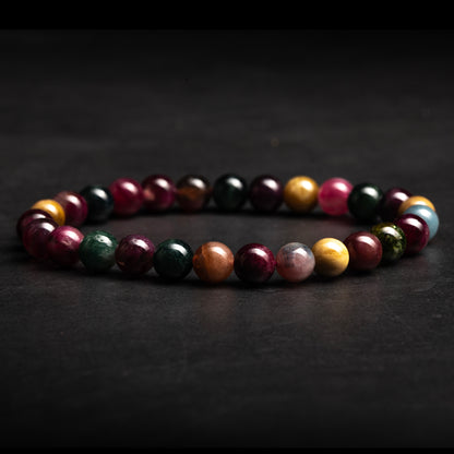 Multicolored beaded bracelet on a dark background