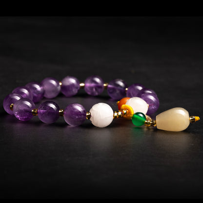 Beaded bracelet with purple, white, and multicolored beads on a dark background